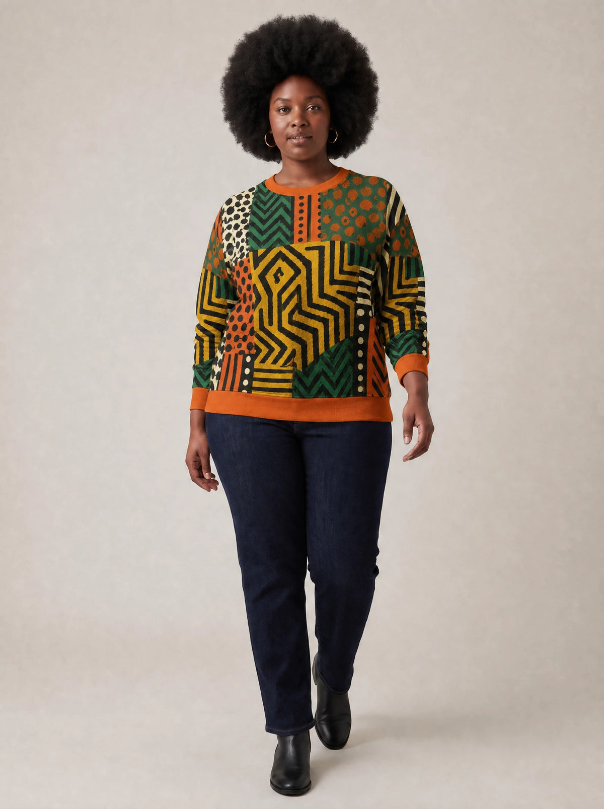 "Vipande" Sweatshirt — three-quarter view on model