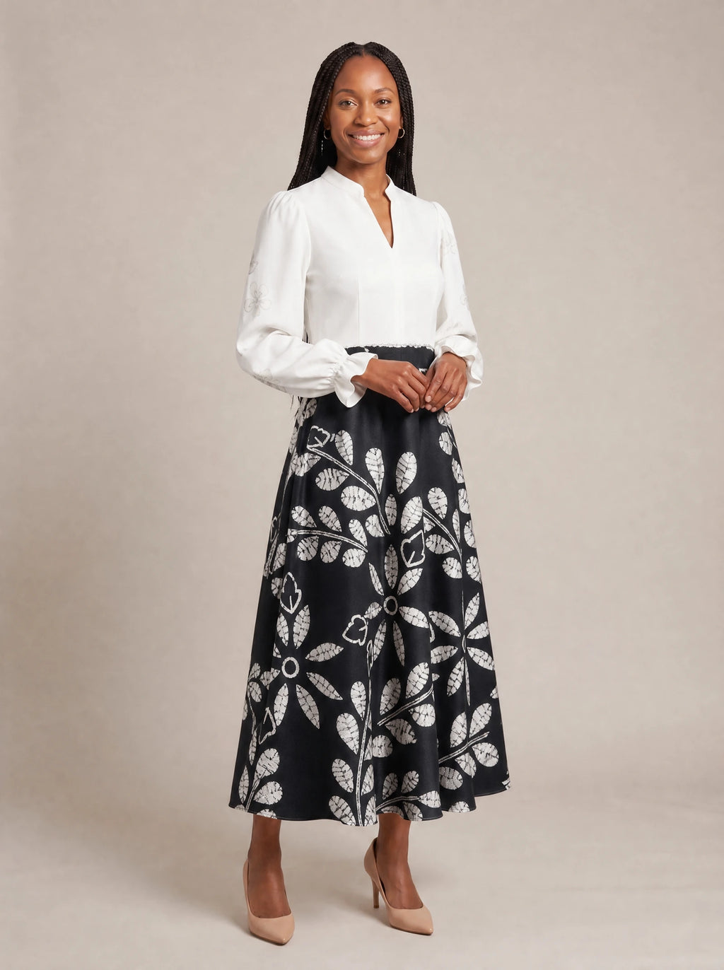 "Kivuli" Long Puff Sleeve Dress — walking, three-quarter view on model