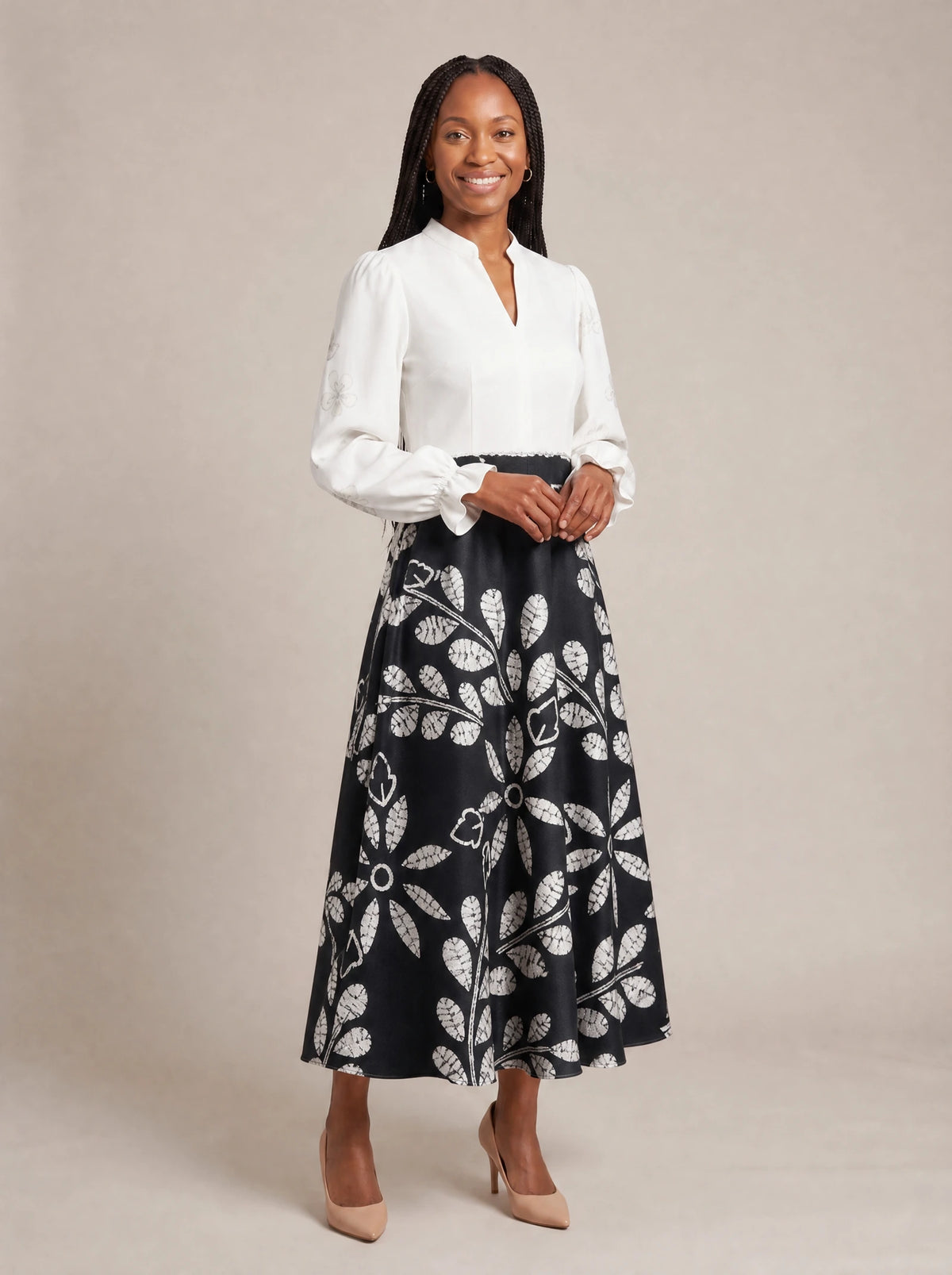 "Kivuli" Long Puff Sleeve Dress — walking, three-quarter view on model