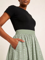 "Oshun Verde" Twirl Skirt — close-up of the waistband and side pocket