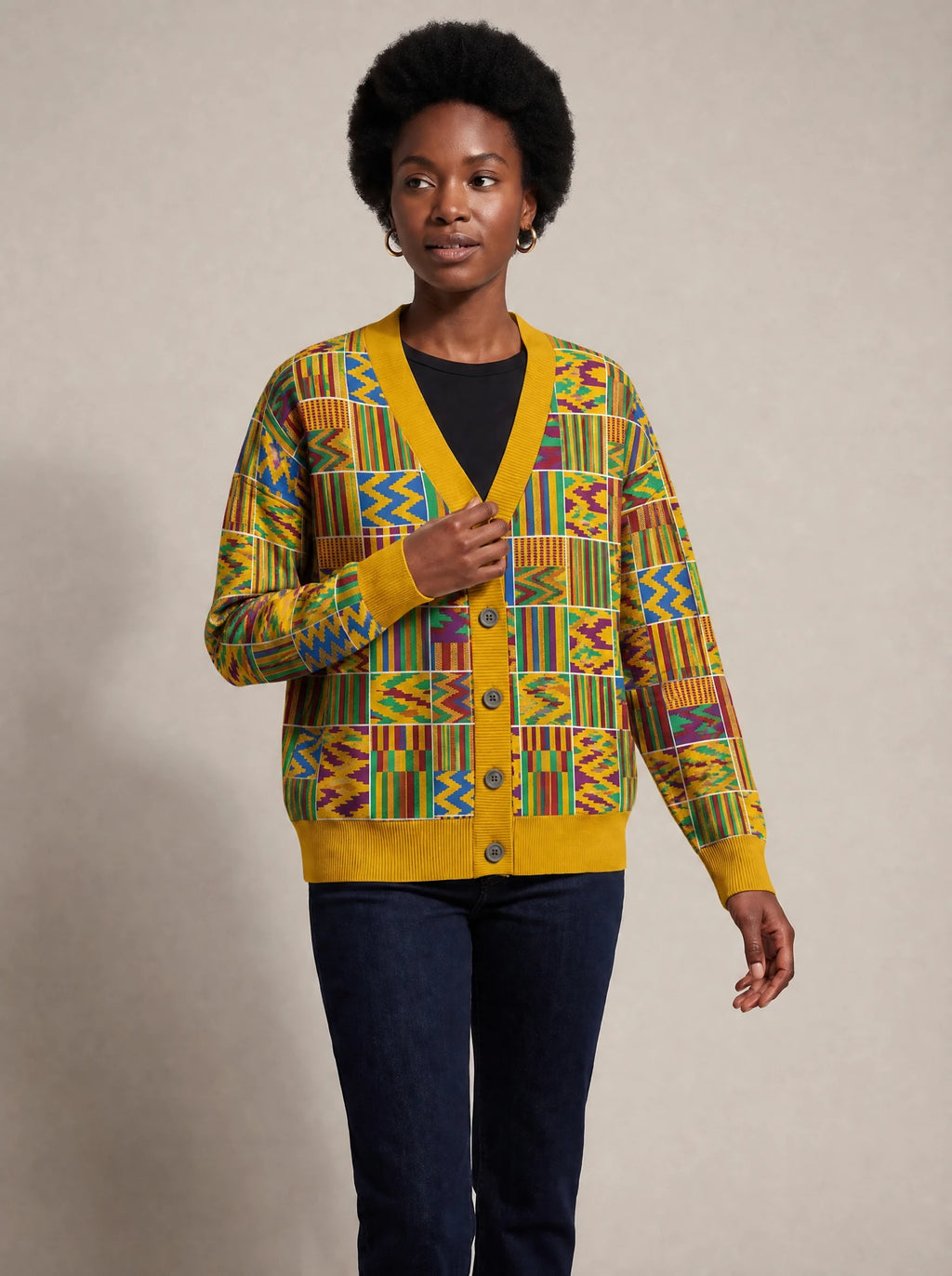 "Shangwe" Cardigan — three-quarter view on model