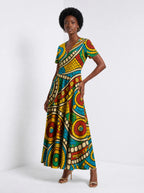 "Taji" Short Sleeve Maxi Dress — walking, three-quarter view on model