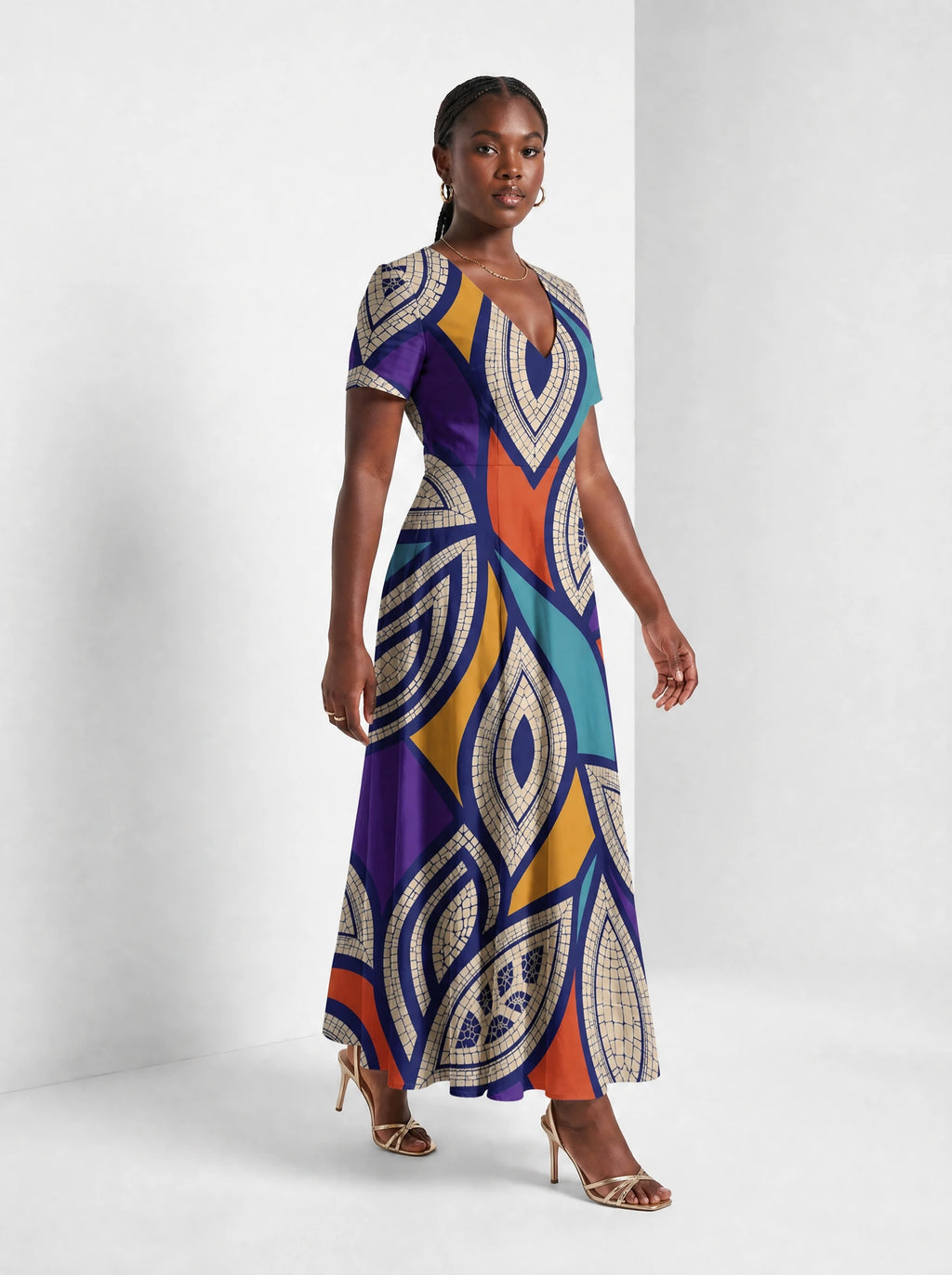 "Johari" Short Sleeve Maxi Dress — walking, three-quarter view on model