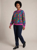 "Rangi" Sweatshirt — three-quarter view on model