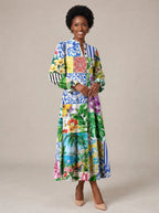 "Kisiwa" Long Puff Sleeve Dress — walking, three-quarter view on model