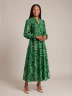 "Asili" Emerald Long Puff Sleeve Dress — walking, three-quarter view on model