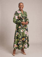 "Kasuku" Long Puff Sleeve Dress — walking, three-quarter view on model