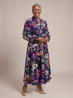 "Njozi" Long Puff Sleeve Dress — walking, three-quarter view on model