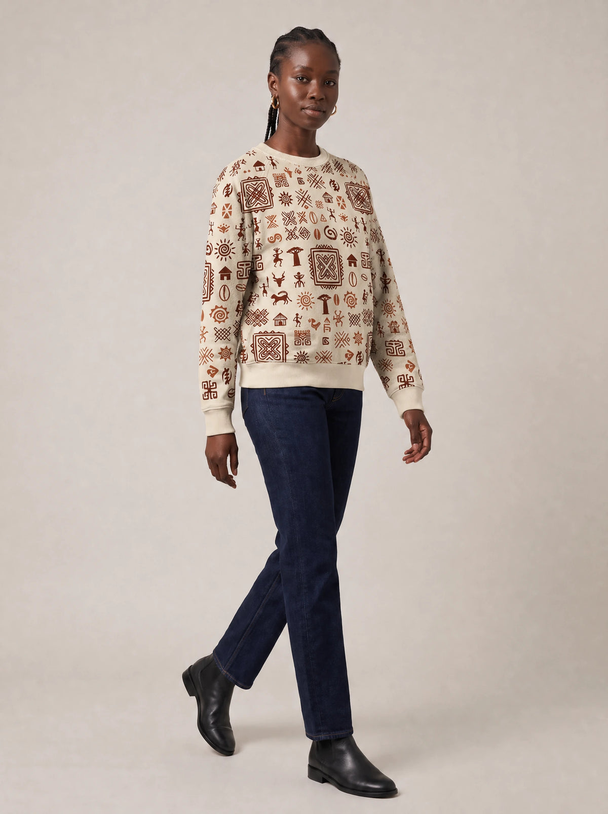 "Hadithi" Sweatshirt — three-quarter view on model