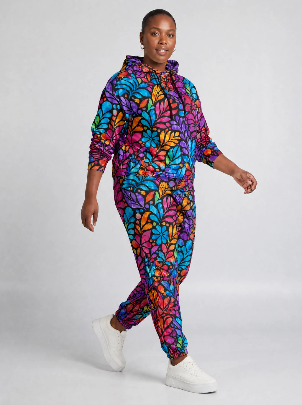 "Rangi" Hoodie & Jogger Set — walking three-quarter view on model