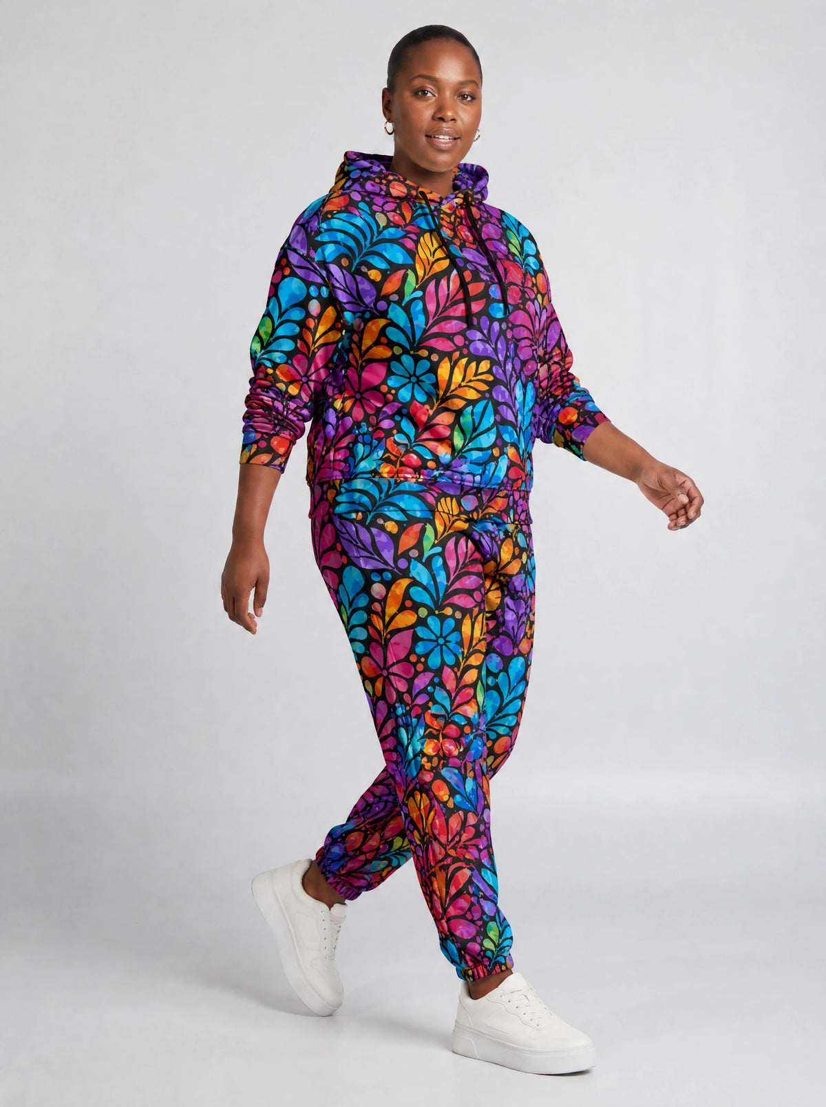 "Rangi" Hoodie & Jogger Set — walking three-quarter view on model