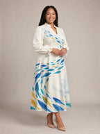 "Samaki" Long Puff Sleeve Dress — walking, three-quarter view on model