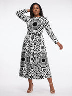 "Mwanga" Viscose Midi Dress — three-quarter view on model, hand in the side pocket
