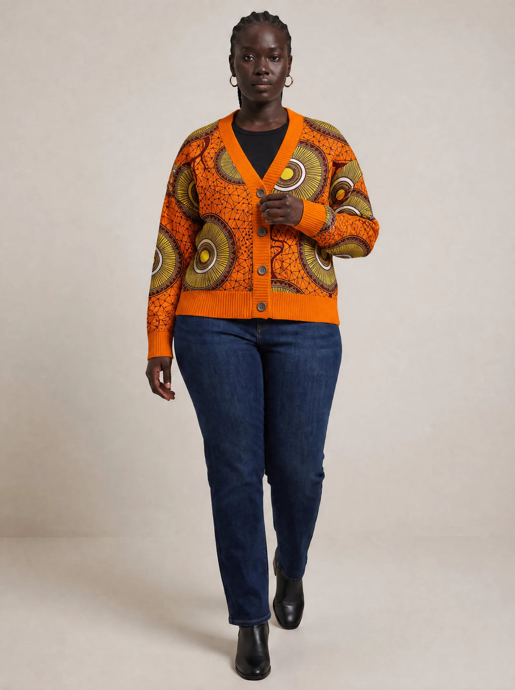 "Mchana" Cardigan — three-quarter view on model