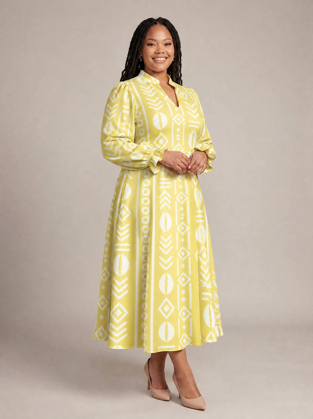 "Oshun Dhahabu" Long Puff Sleeve Dress — walking, three-quarter view on model