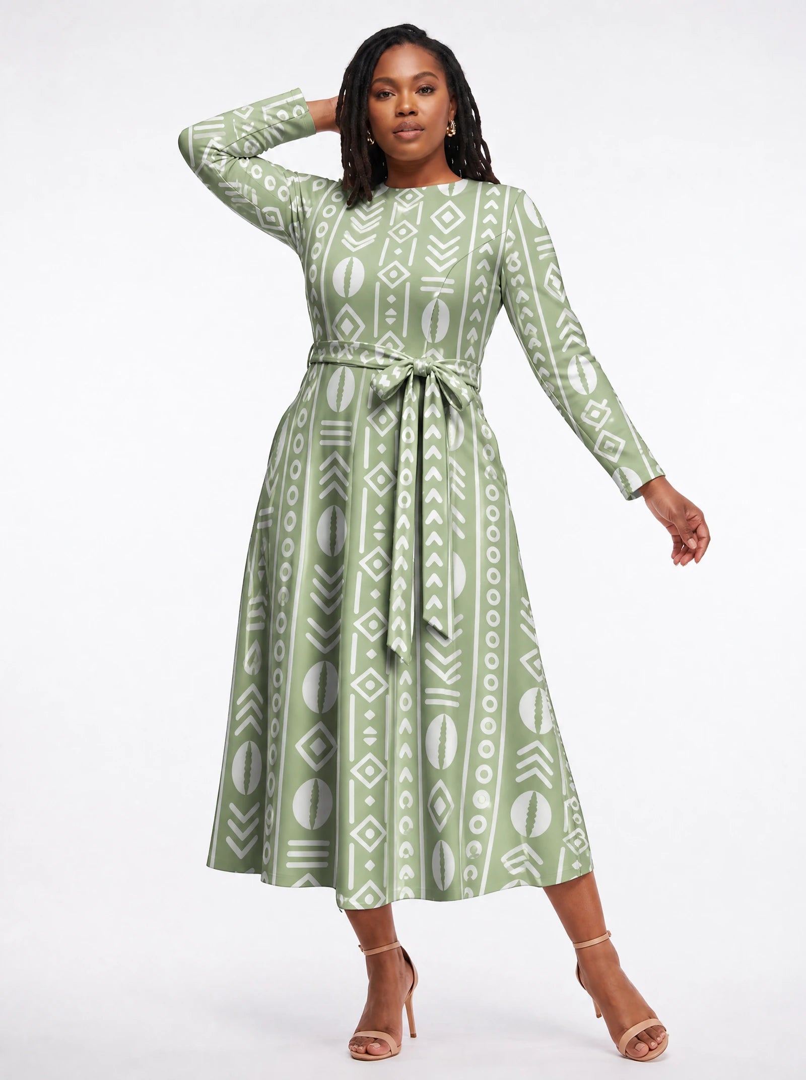"Oshun Verde" Viscose Midi Dress — three-quarter view on model, hand in the side pocket