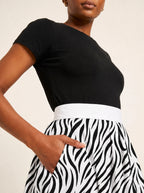 "Milia" Twirl Skirt — close-up of the waistband and side pocket