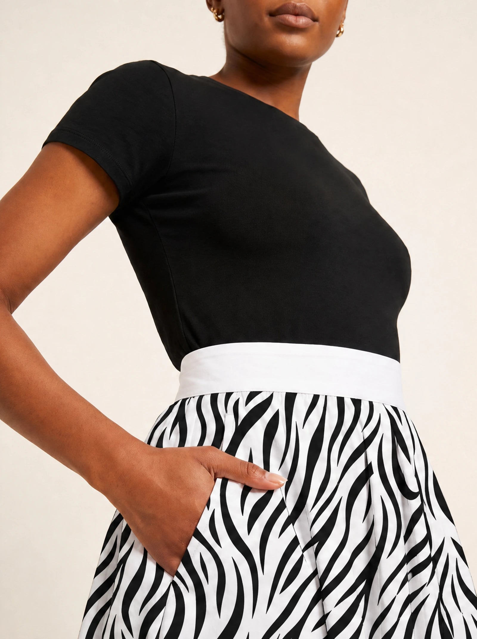 "Milia" Twirl Skirt — close-up of the waistband and side pocket