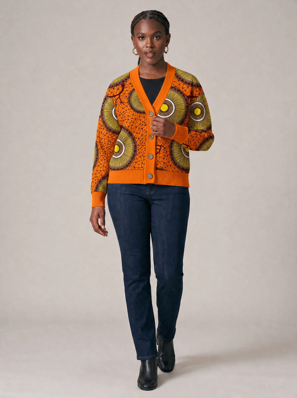 "Mchana" Cardigan — three-quarter view on model