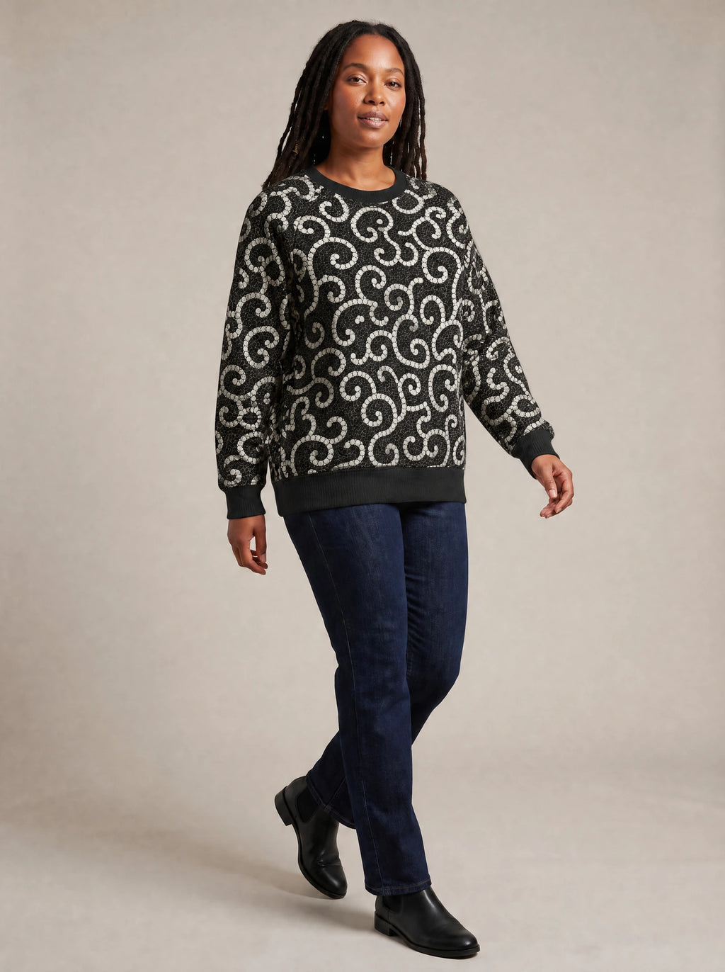 "Duara" Sweatshirt — three-quarter view on model