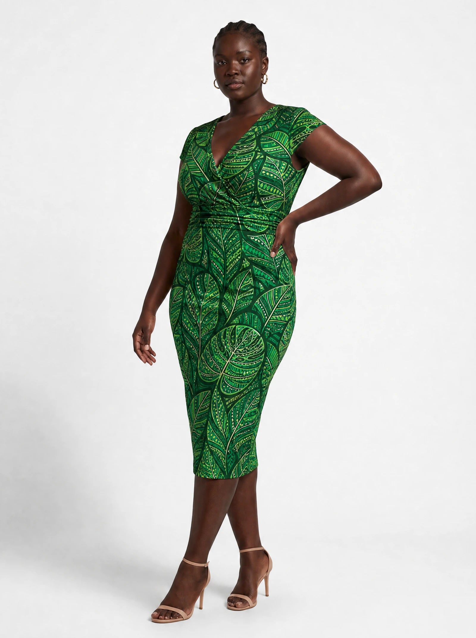 "Asili Emerald" Cap Sleeve Midi Dress — three-quarter view on model