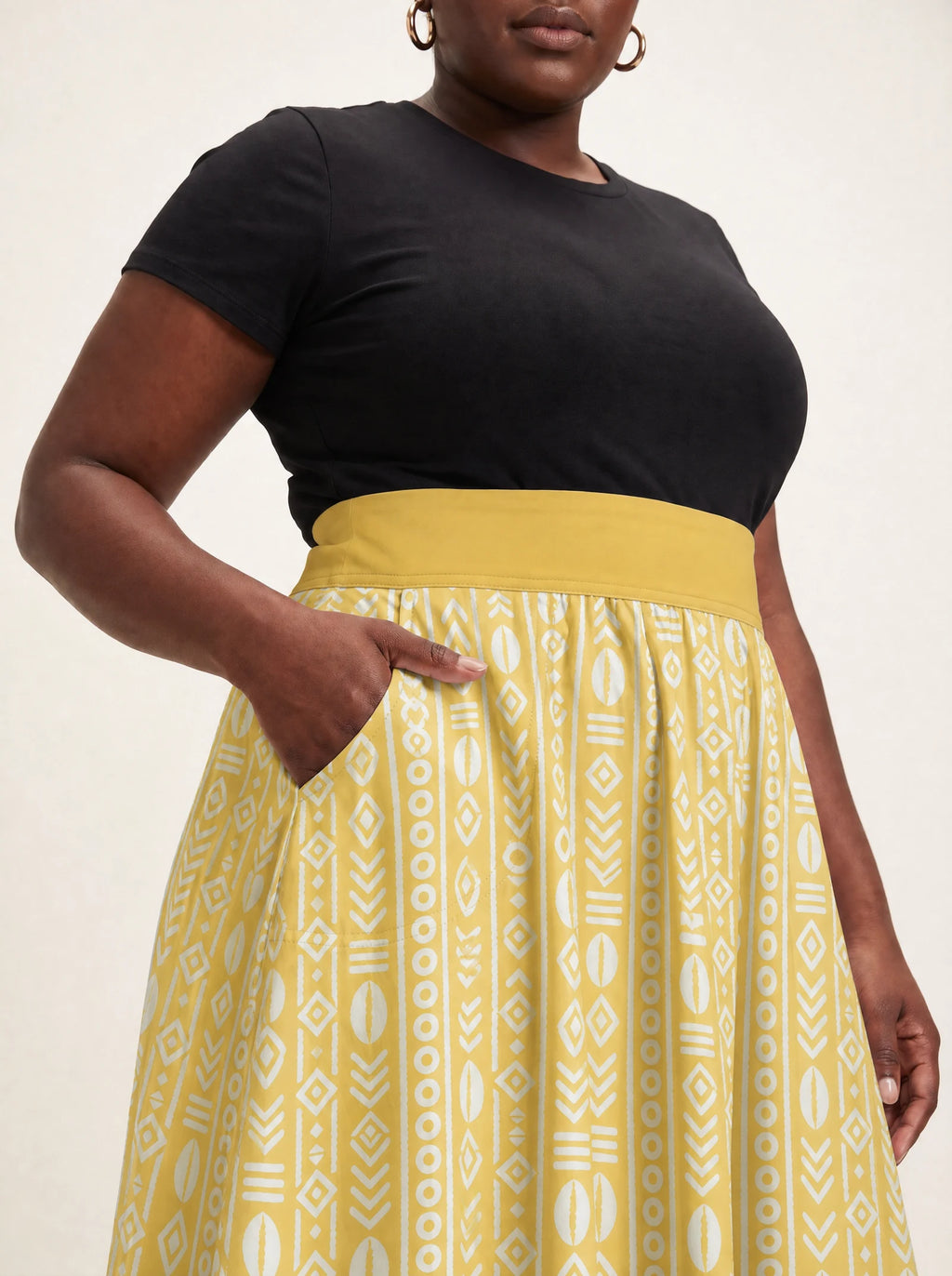 "Oshun Dhahabu" Twirl Skirt — close-up of the waistband and side pocket