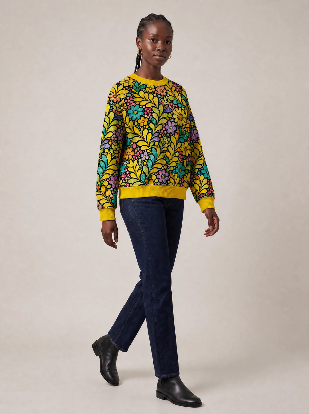 "Njano" Sweatshirt — three-quarter view on model