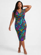 "Upinde" Cap Sleeve Midi Dress — three-quarter view on model