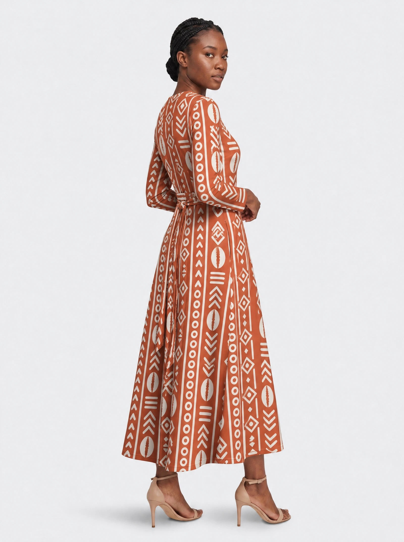 "Oshun Kijani" Viscose Midi Dress — three-quarter view on model, hand in the side pocket