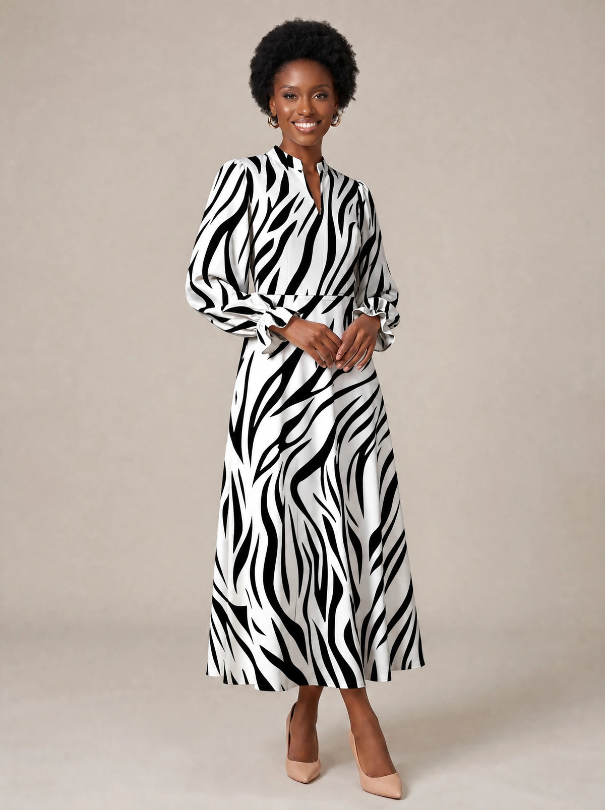 "Milia" Long Puff Sleeve Dress — walking, three-quarter view on model