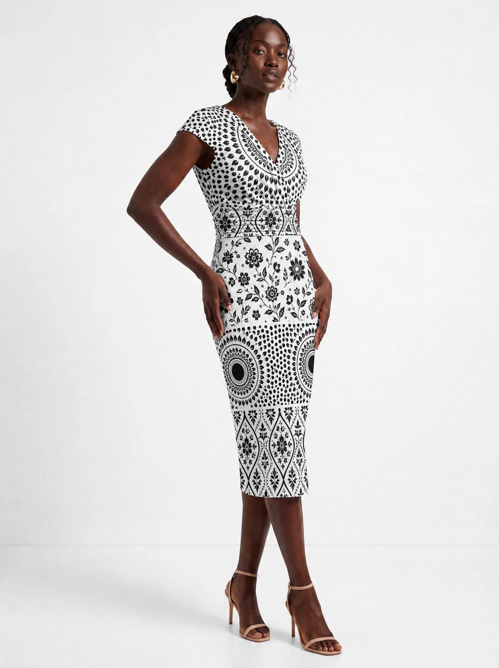 "Mwanga" Cap Sleeve Midi Dress — three-quarter view on model