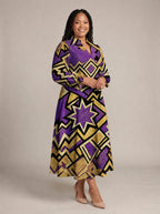 "Sheba" Long Puff Sleeve Dress — walking, three-quarter view on model