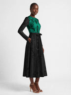 "Green Witch" Long Sleeve Midaxi Dress — walking, three-quarter view on model