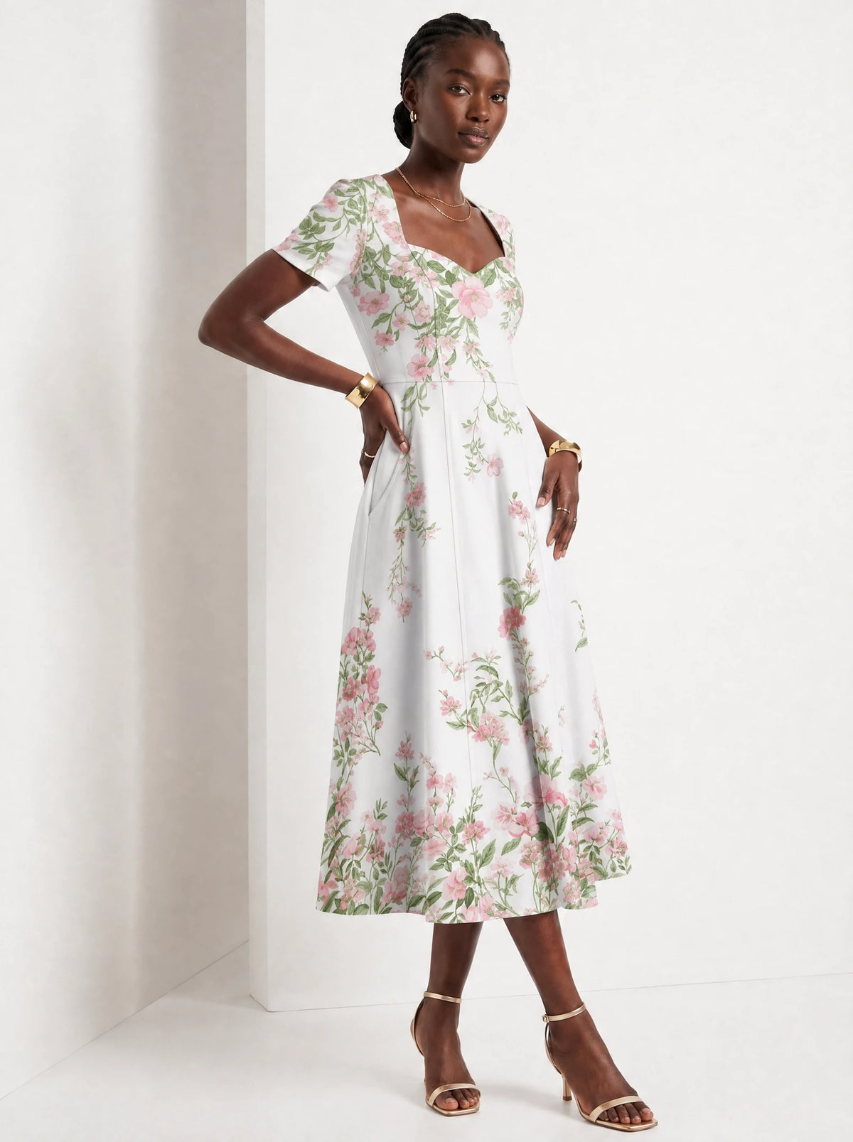 "Chanua" Sweetheart Midi Dress — three-quarter view on model