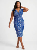 "Oshun Royal Blue" Cap Sleeve Midi Dress — three-quarter view on model
