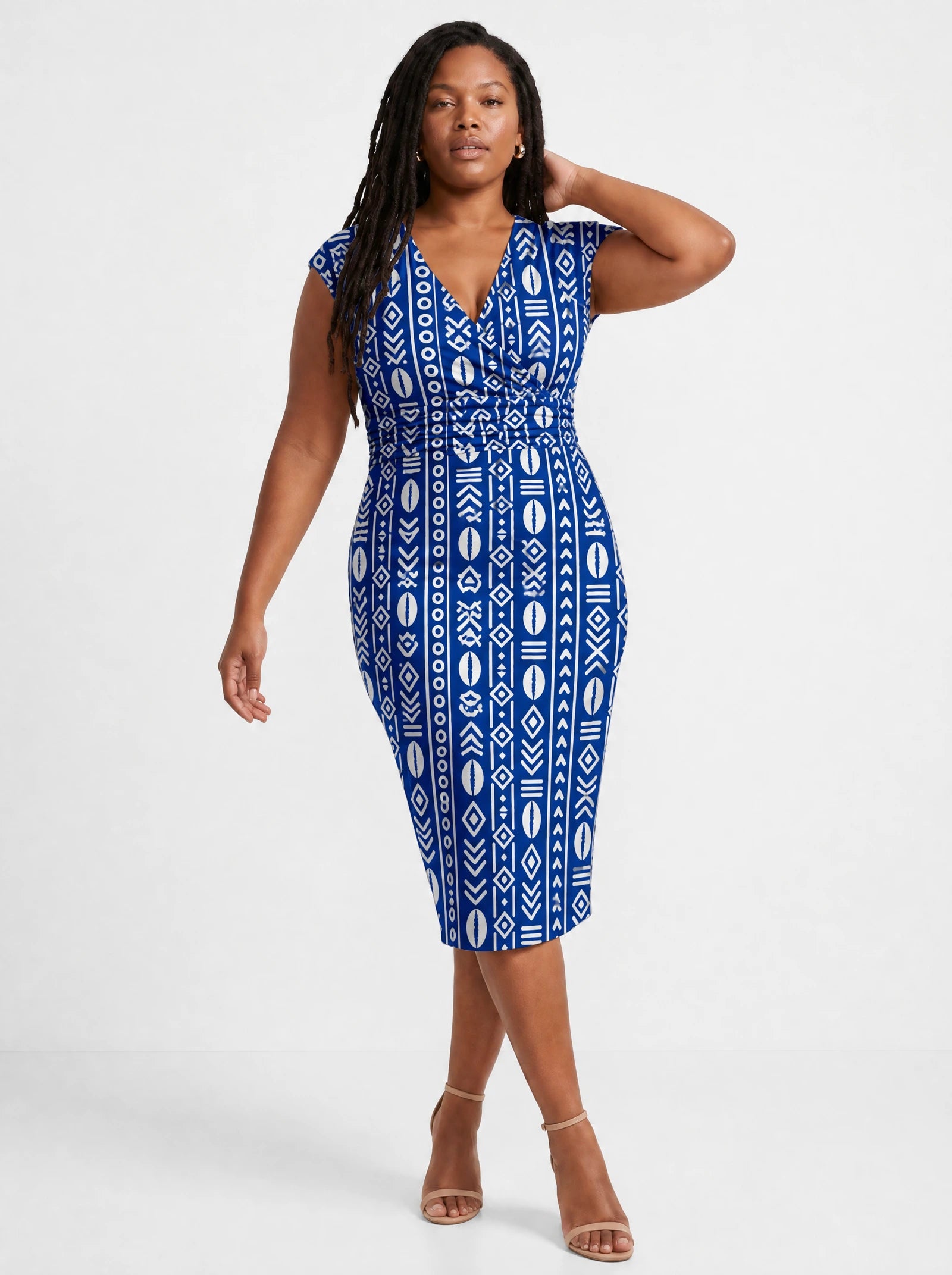 "Oshun Royal Blue" Cap Sleeve Midi Dress — three-quarter view on model