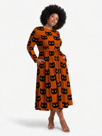 "Paka" Halloween Long Sleeve Midaxi Dress — walking, three-quarter view on model