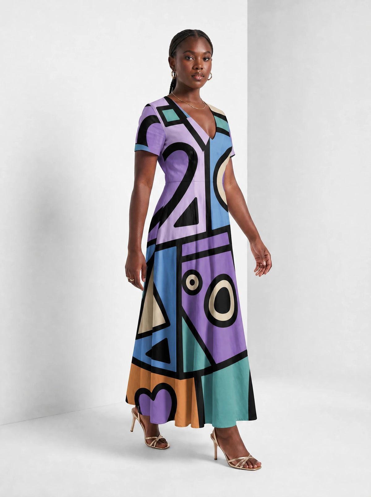 "Sanaa" Short Sleeve Maxi Dress — walking, three-quarter view on model