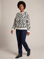 "Milia" Sweatshirt — three-quarter view on model