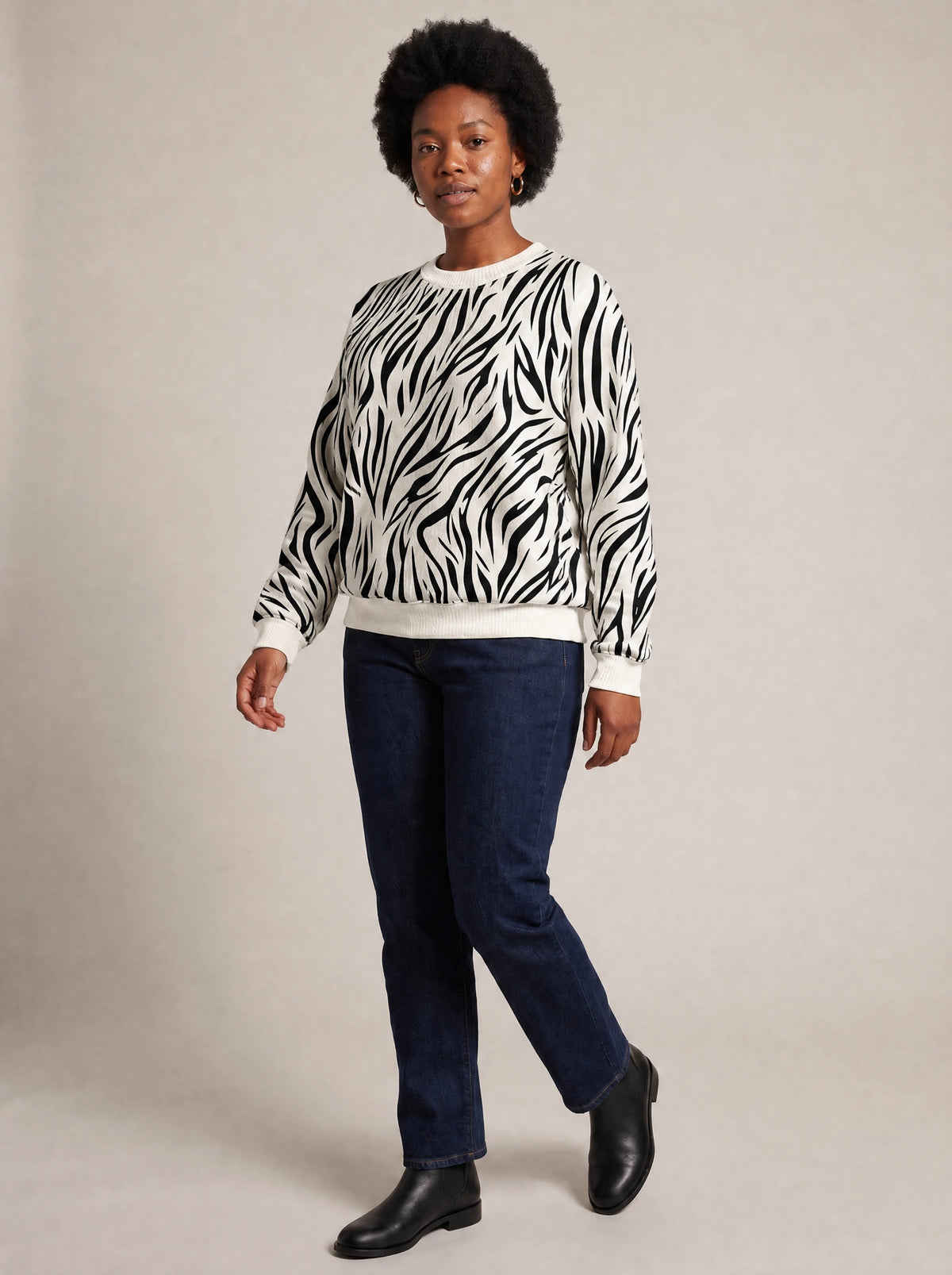 "Milia" Sweatshirt — three-quarter view on model