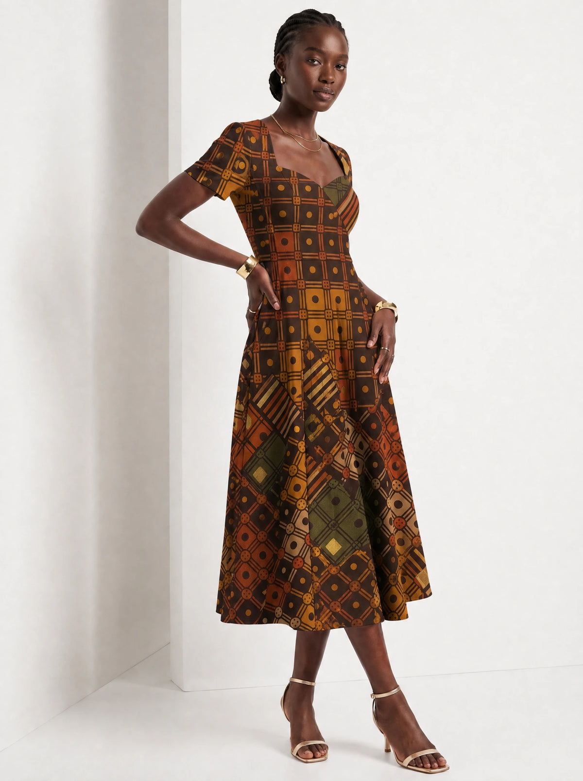 "Mkeka" Sweetheart Midi Dress — three-quarter view on model