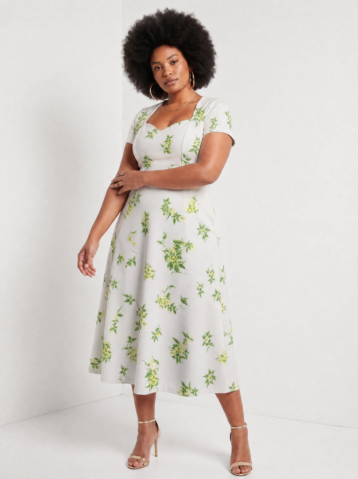 "Yasmini" Sweetheart Midi Dress — three-quarter view on model
