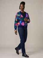 "Bustani" Cardigan — three-quarter view on model