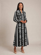 "Kuba" Long Puff Sleeve Dress — walking, three-quarter view on model