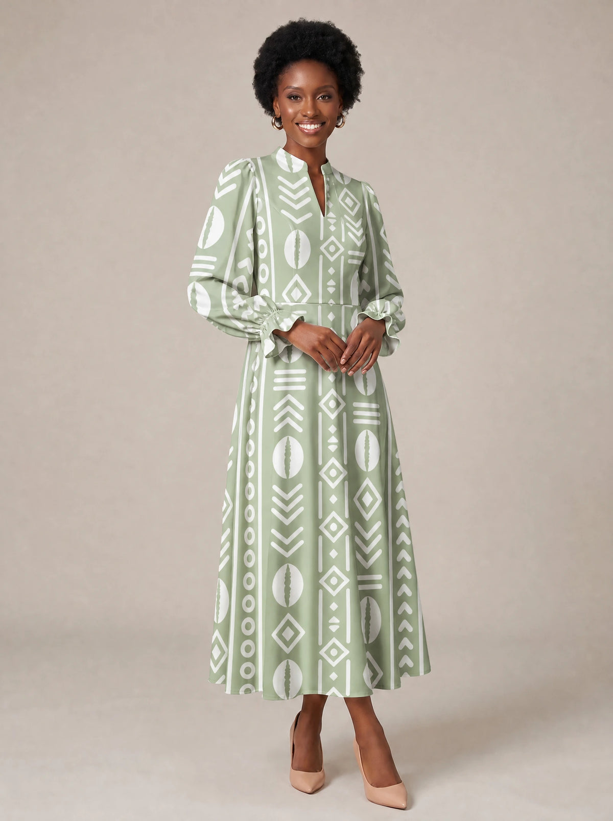 "Oshun Verde" Long Puff Sleeve Dress — walking, three-quarter view on model