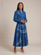 "Pwani" Long Puff Sleeve Dress — walking, three-quarter view on model
