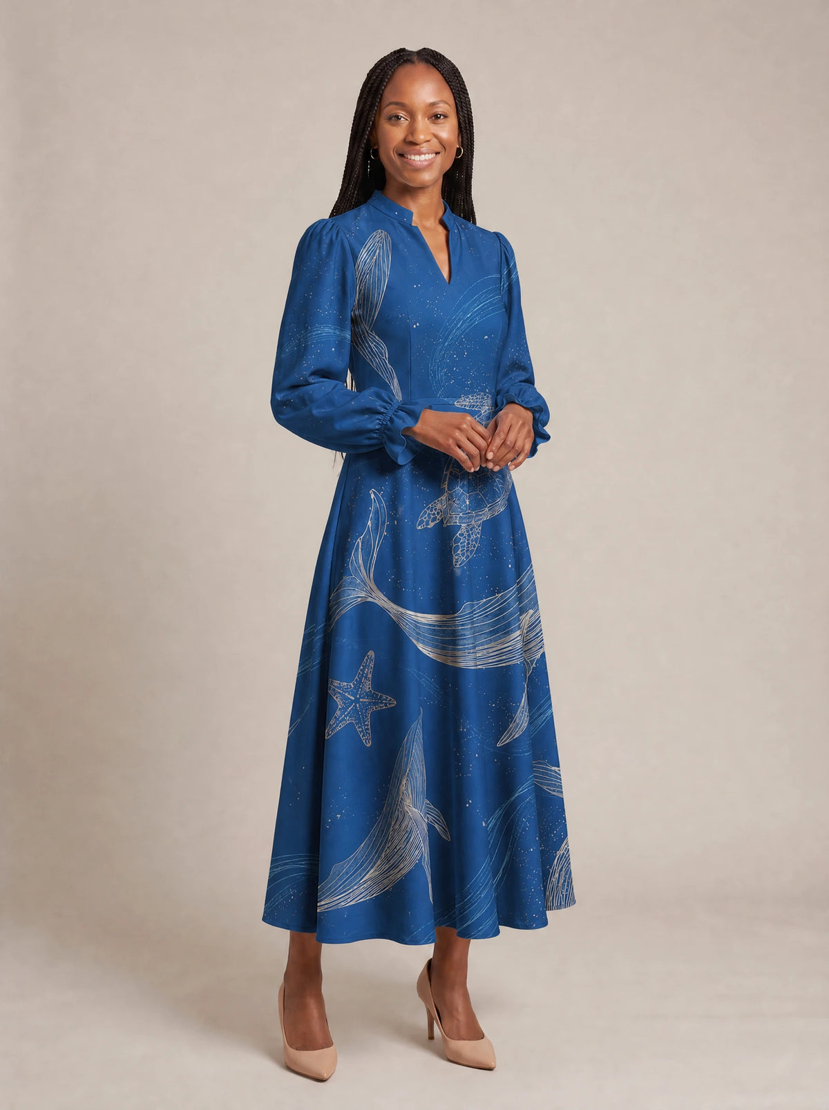 "Pwani" Long Puff Sleeve Dress — walking, three-quarter view on model