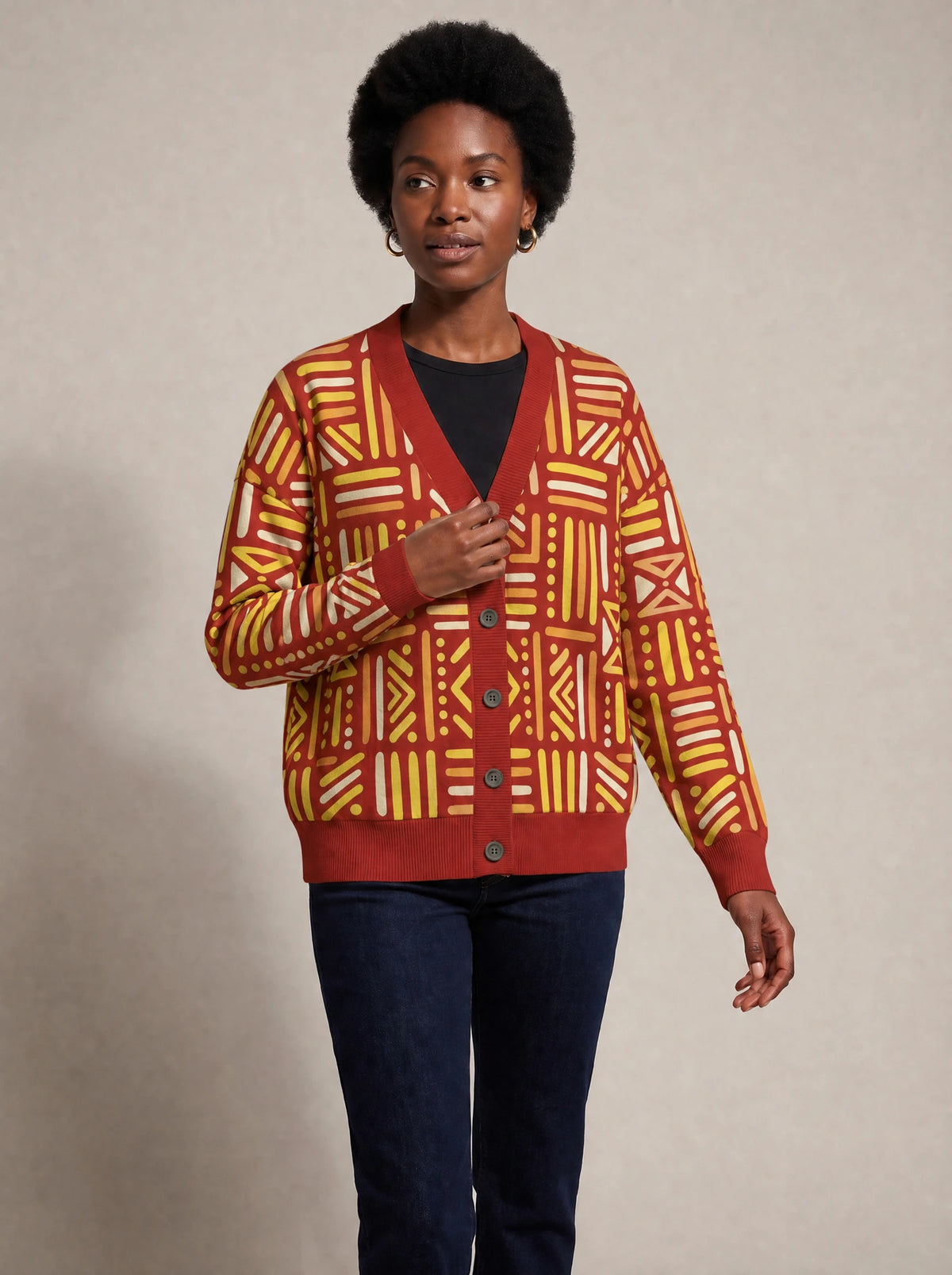 "Mistari" Cardigan — three-quarter view on model