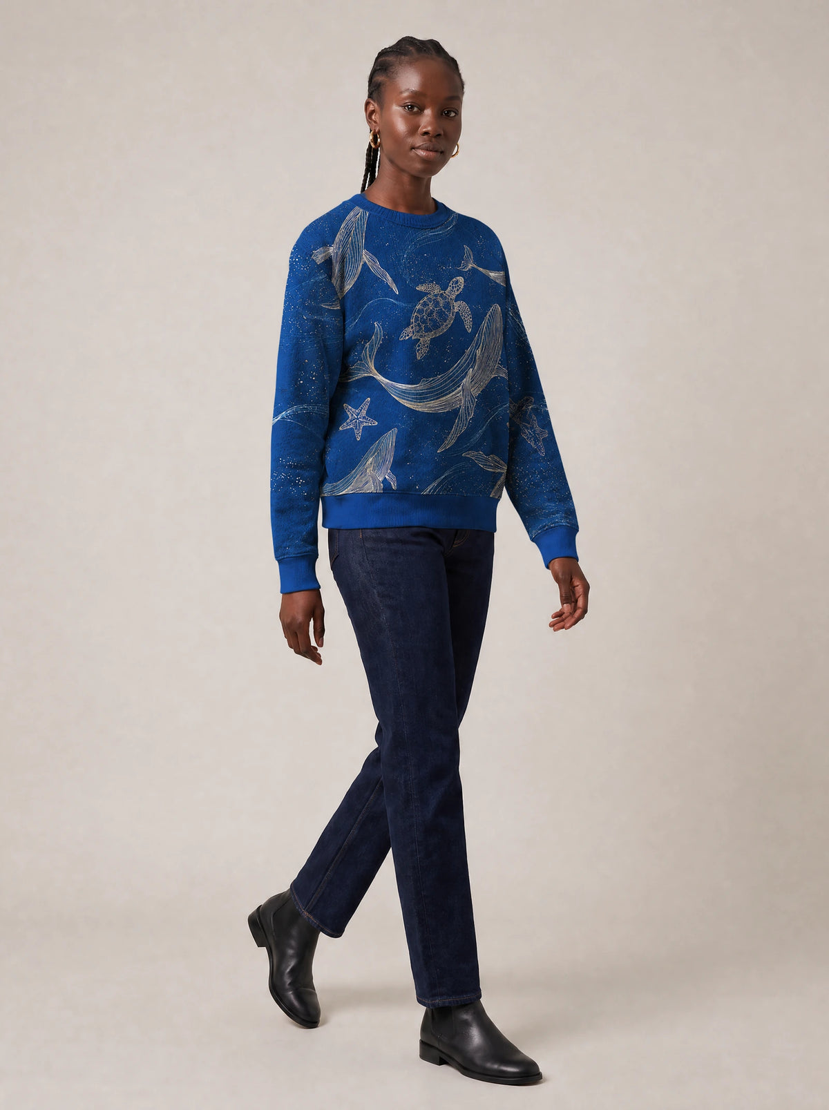 "Pwani" Sweatshirt — three-quarter view on model