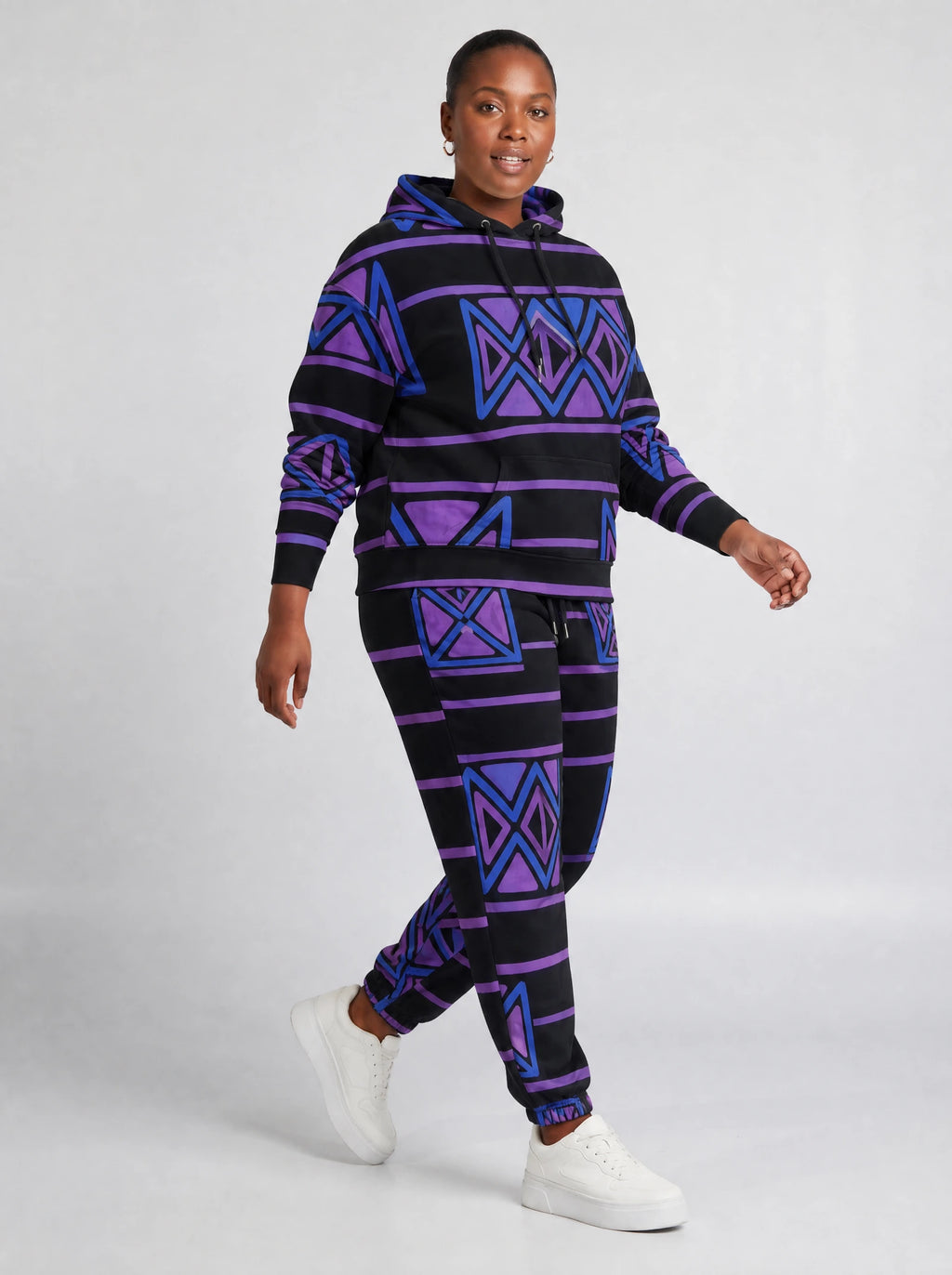 "Jioni" Black Violet Hoodie & Jogger Set — walking three-quarter view on model